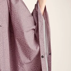 Drench Unisex Waterproof Poncho - Dusky Pink Wiggle Print